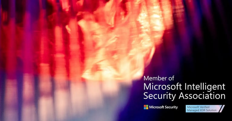 Abstract red, orange and purple light pattern with Microsoft Security branding, stating ‘Member of Microsoft Intelligent Security Association’ and ‘Microsoft Verified Managed XDR Solution'