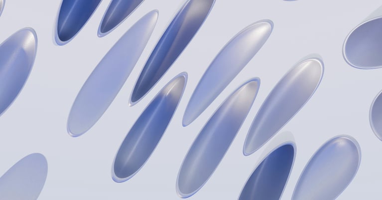 Abstract blue and silver capsule-shaped 3D forms floating on a light grey background, representing modern artificial intelligence, automation and digital transformation concepts.