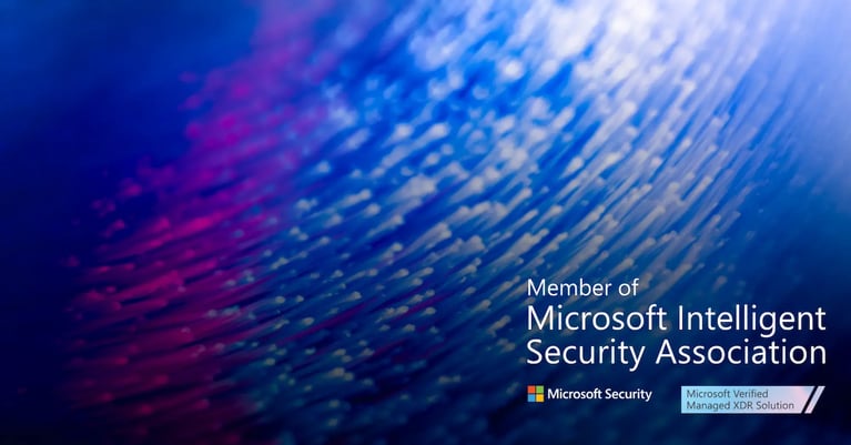 Blue and purple fibre-optic strands with Microsoft Security branding, stating ‘Member of Microsoft Intelligent Security Association’ and ‘Microsoft Verified Managed XDR Solution