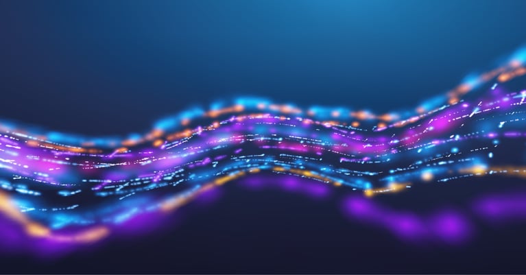Abstract digital waves of glowing blue, purple and gold light representing AI data flows, visibility and secure AI governance.