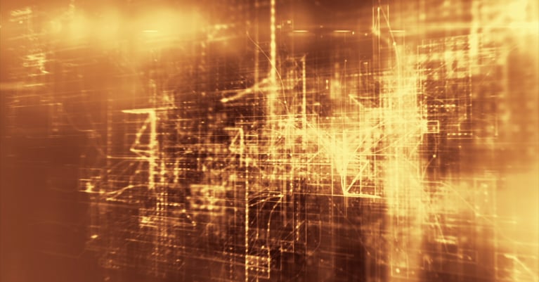 Abstract digital network visualisation in warm amber and gold tones, featuring interconnected lines, geometric shapes and layered data pathways. The image creates the impression of continuous data flow, complex system analysis and AI-driven security monitoring within a highly connected digital environment.